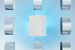Image White rectangular box centered among metallic silver rings against a softly glowing blue background.