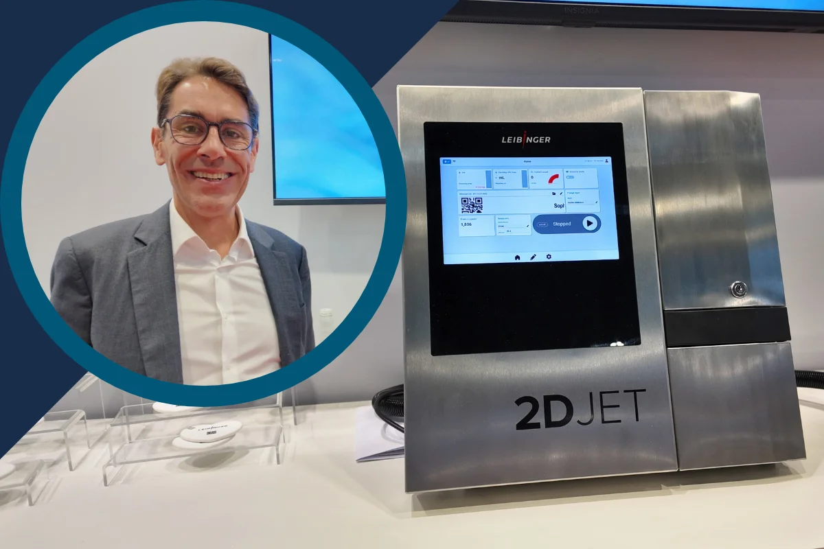 Image Pack Expo 2026 Leibinger Group video thumbnail: Smiling man in glasses and a grey blazer pictured alongside the Leibinger 2D JET industrial inkjet printer with touchscreen display.