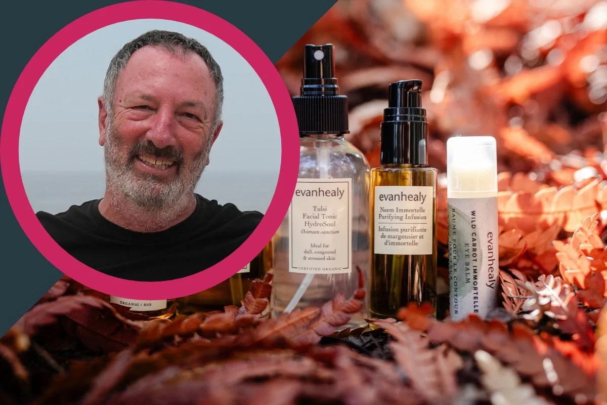 EvanHealy video thumbnail: Smiling bearded man alongside Evanhealy organic skincare products, including facial tonic, purifying infusion and eye balm, set among autumn leaves