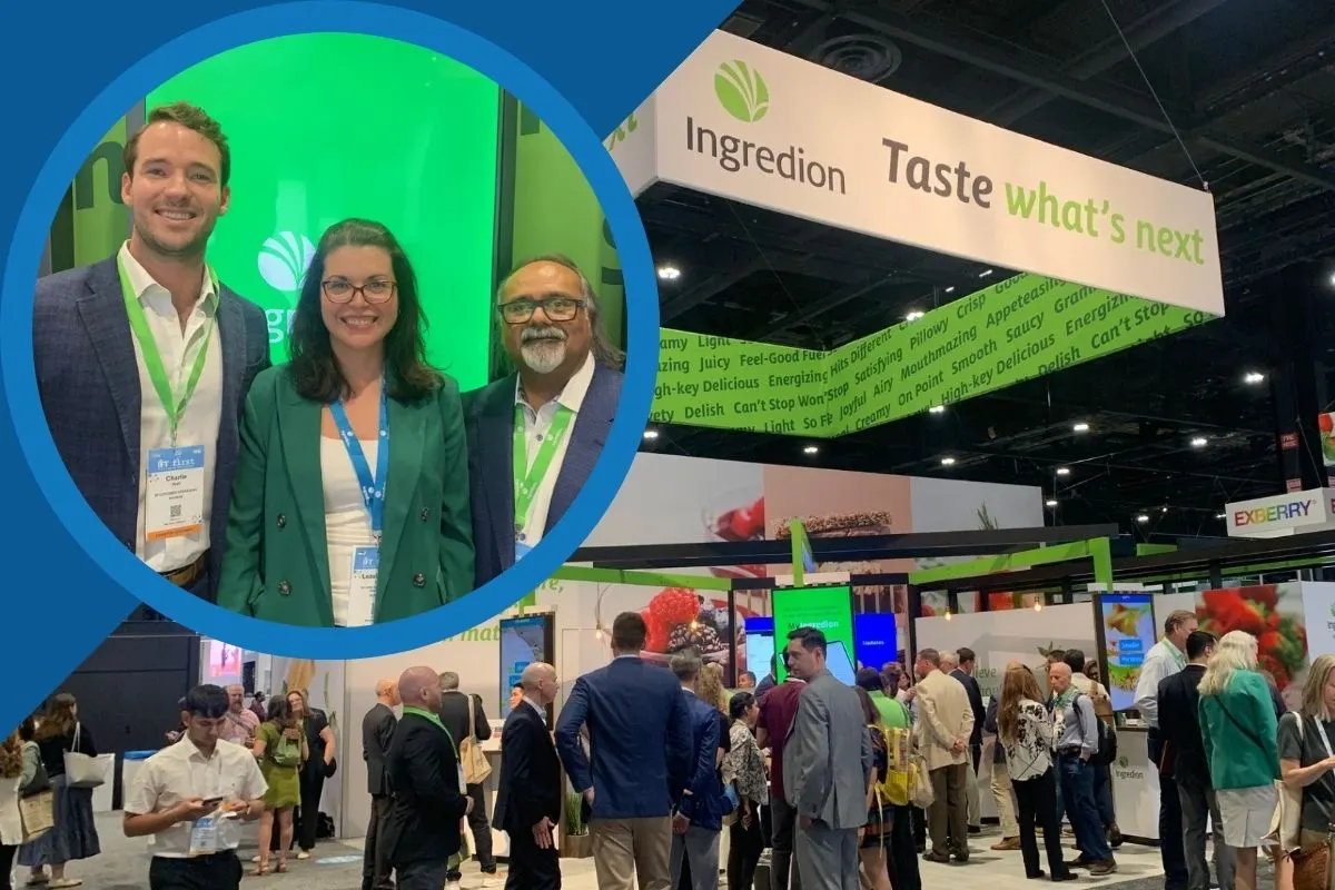 Image IFT First 2026 Ingredion video thumbnail: Ingredion trade show booth crowded with attendees, with three smiling representatives featured in a circular inset